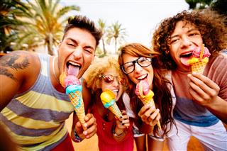 Friends Taking Selfie With Ice Cream