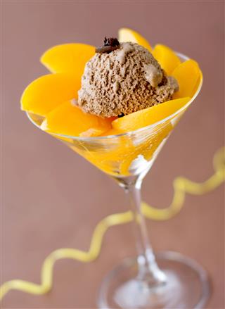 Dessert Of Peaches And Ice Cream