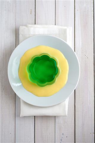Green Jelly With Vanilla Sauce