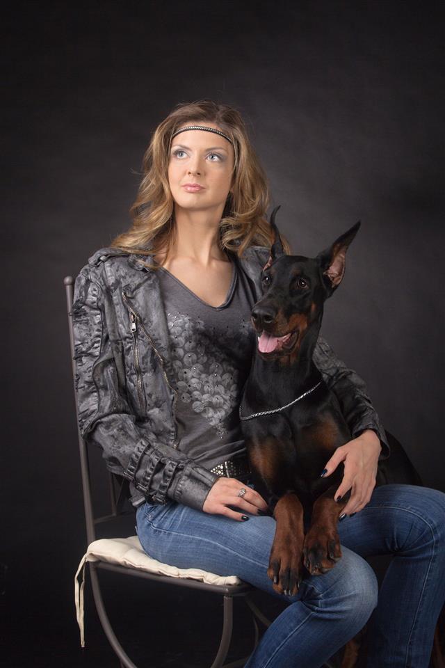 Woman With Doberman Dog