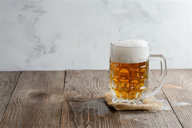 Glass Of Beer With Foam
