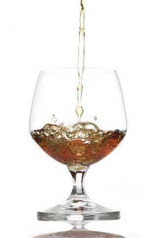 Pouring Brandy Into Glass