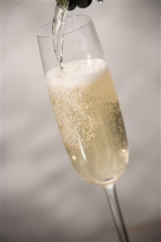 Champagne Pouring Into A Glass