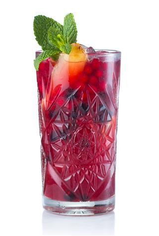 Alcohol Cocktail With Fruits And Berries