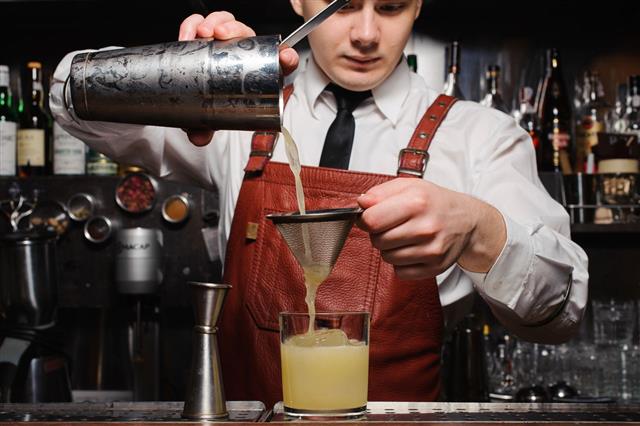 Bartender Pouring Fresh Cocktail