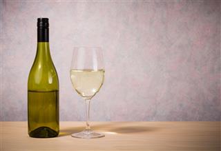 Glass And Bottle Of White Wine