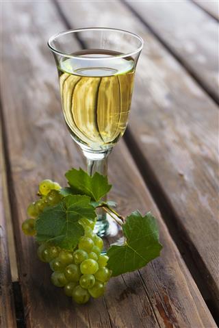 White Wine With Bunch Of Grapes