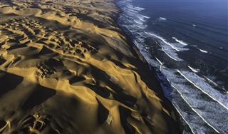 Sand Dunes And Ocean