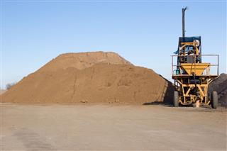 Pile Of Sand With Crusher