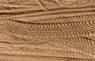 Tire Tracks On Sand