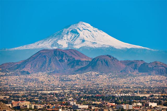 Popocatepetl Volcano And Mexico City