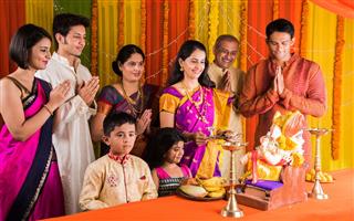 Indian Family Doing Ganesh Puja