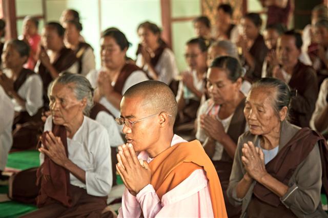 Buddhist People Praying