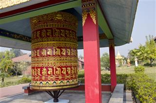 Big Ornate Buddhists Prayer Wheel In Lumbini Nepal