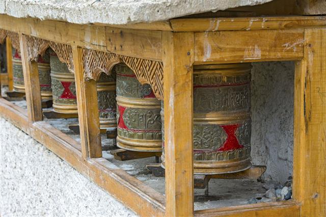 Buddhist Prayer Wheels In Tibet