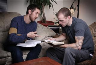 Young Men Having A Bible Study