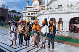 Sikh Men In Golden Temple Amritsar