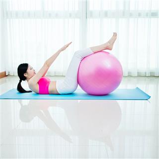 Attractive Girl Exercise With Fitness Ball