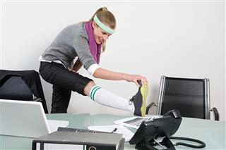 Office Worker Stretching Her Leg