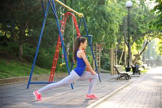 Young Athletic Woman Doing An Exercise