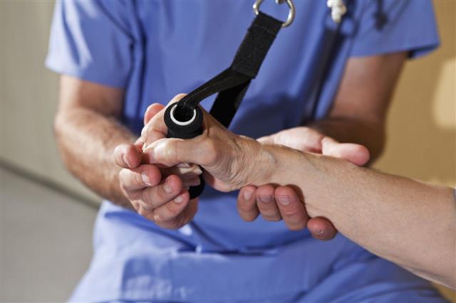 Therapist Working With Patients Wrist