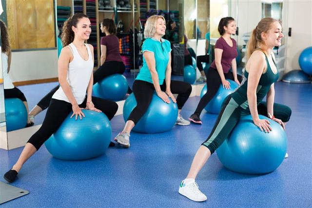 Women Jumping On Exercise Ball