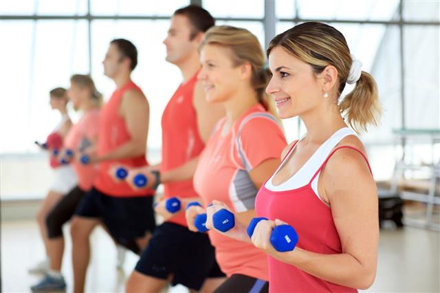 People Doing Exercise With Dumbbells