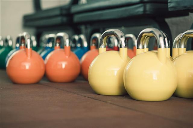 Colorful Kettlebells In Gym