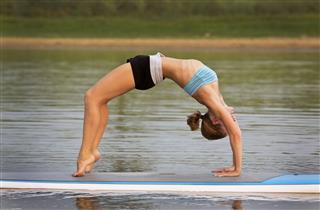 Athletic Woman Practicing Yoga