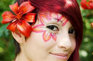 Young Woman With Lily Face Paint