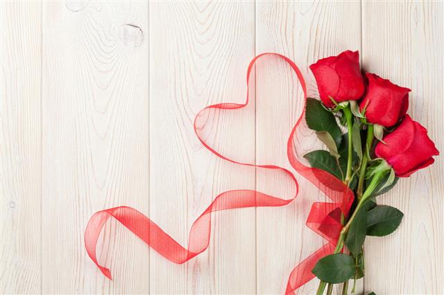 Red Roses And Heart Shape Ribbon