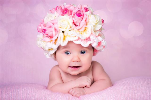 Newborn Baby Girl With Roses