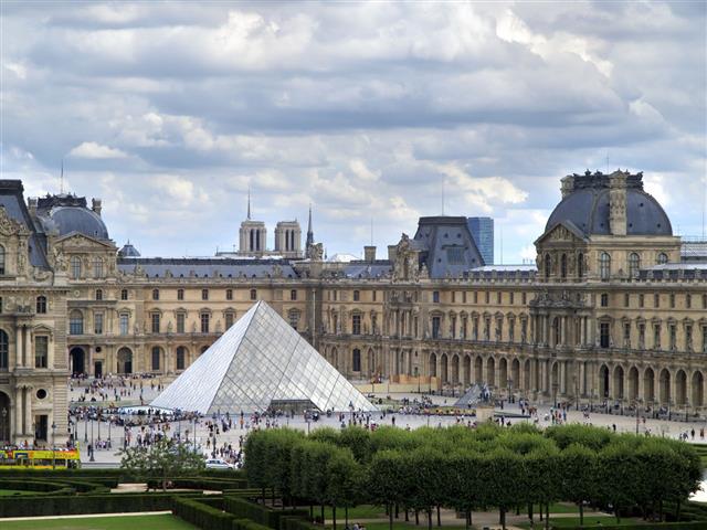 Louvre Museum And Peis Pyramid