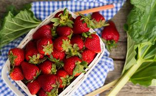 Fresh Ripe Strawberries And Rhubarb