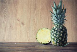 Pineapple On Wooden Table