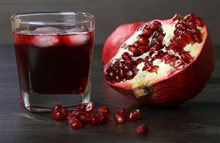Red Pomegranate Fruit And Juice