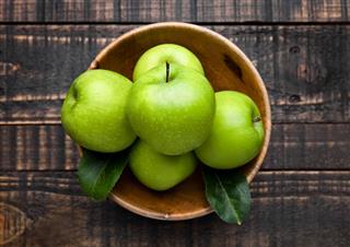 Green Healthy Apples In Bowl