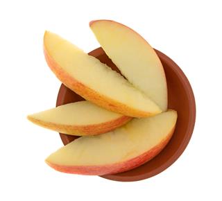 Red Apple Slices In Bowl
