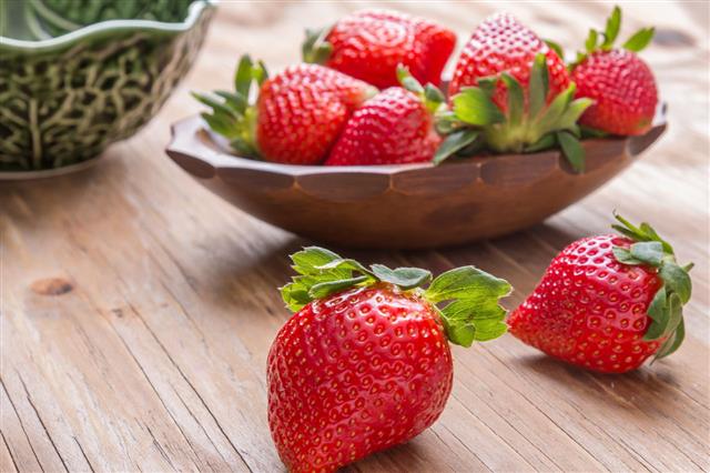 Strawberries In A Wooden Bowl