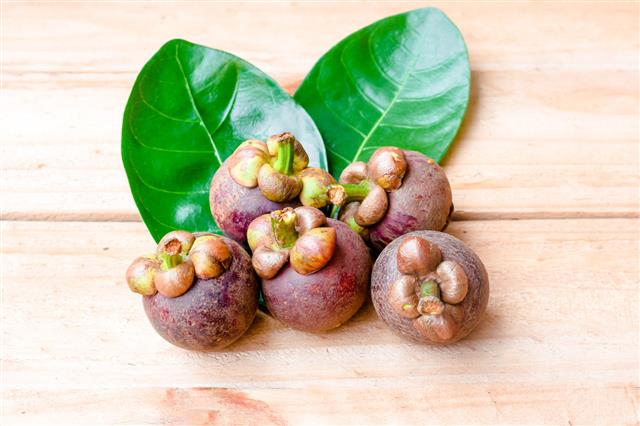 Mangosteen On Rustic Wooden Table Fruit