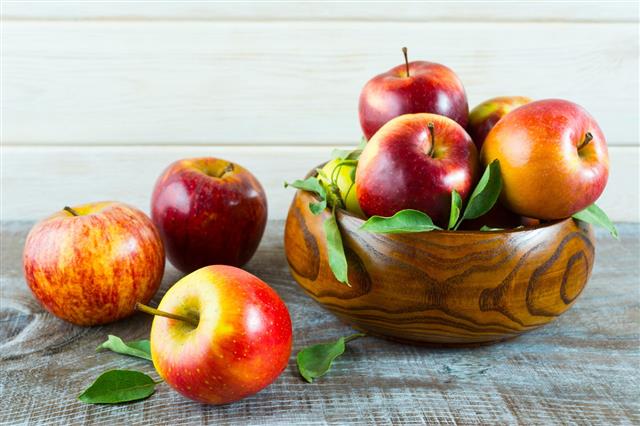 Fresh Apples In The Wooden Bowl