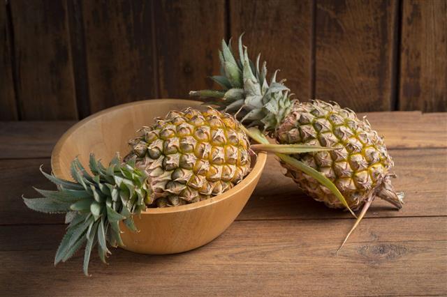 Pineapple On A Wooden Table
