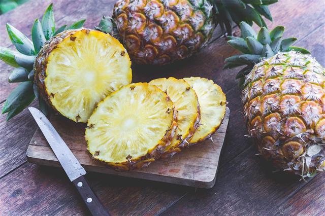 Pineapple Fruit On Wood Table