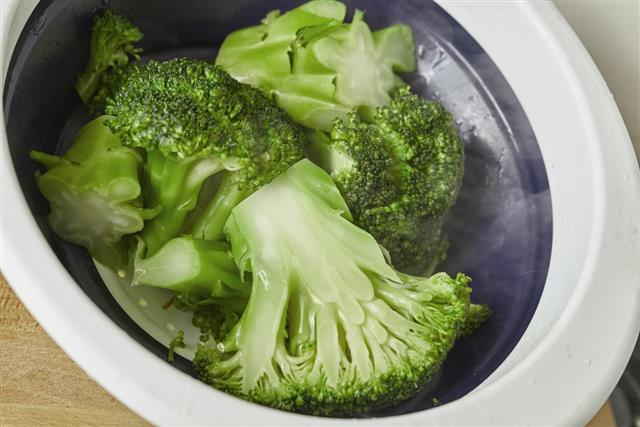 Natural pieces of green healthy broccoli just steamed