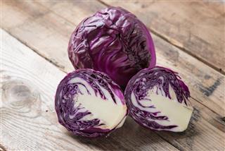 Red cabbage on a wood background
