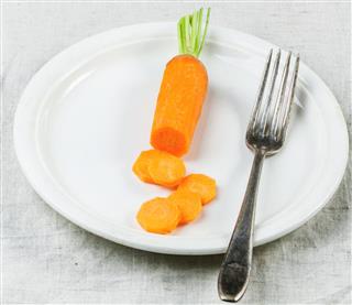 Plate with sliced carrot
