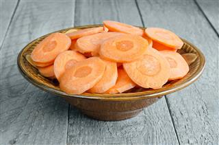 Sliced carrot slices in a bowl