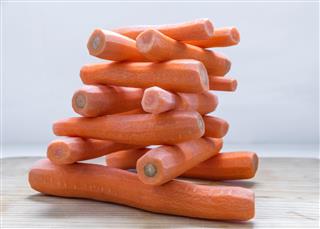 Fresh peeled carrots on the table