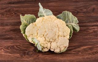 Cauliflower on wood background