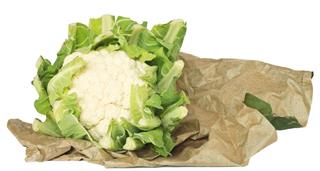Fresh cauliflower in wrapping paper